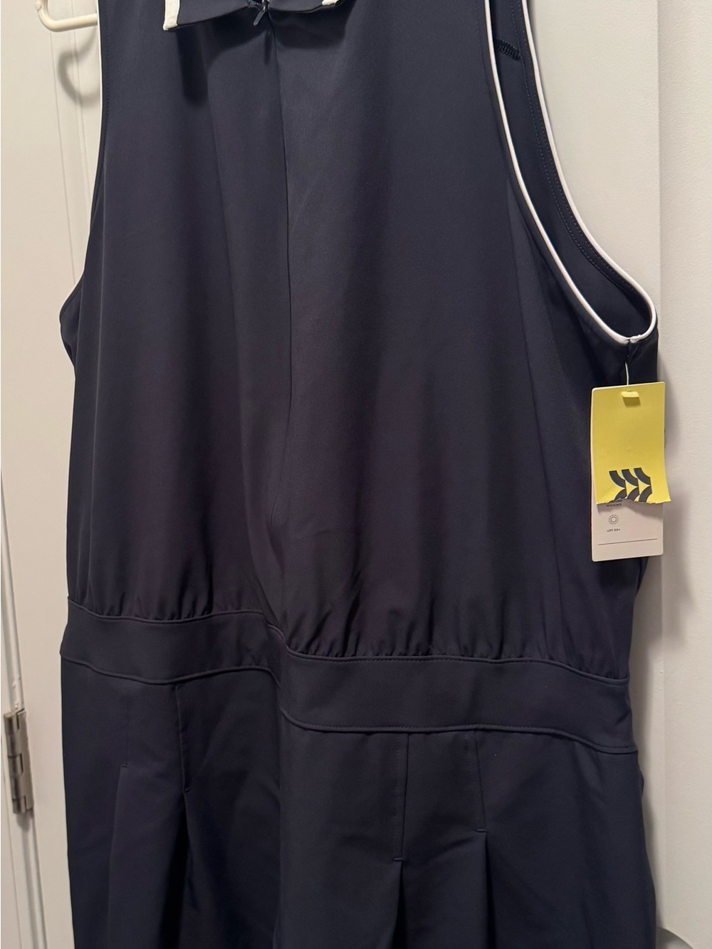 all in motion Black Sleeveless Romper with White Piping Trim